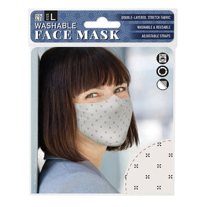 "face-mask-black-cross-on-cream"